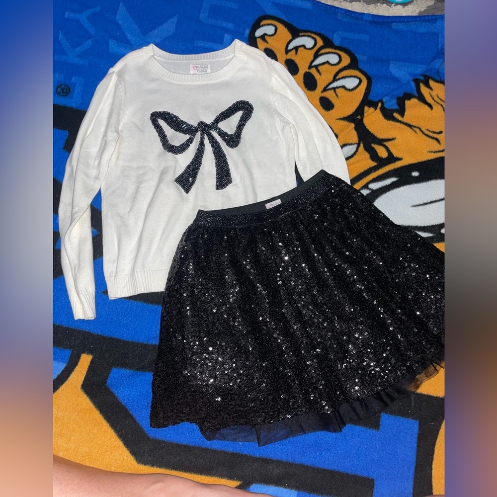 Super cute white and black sequenced sweater and skirt